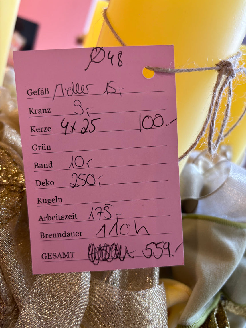 Advent wreath with yellow and gold bows