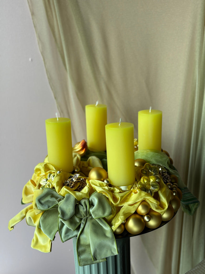 Advent wreath with yellow-green velvet bows and baubles