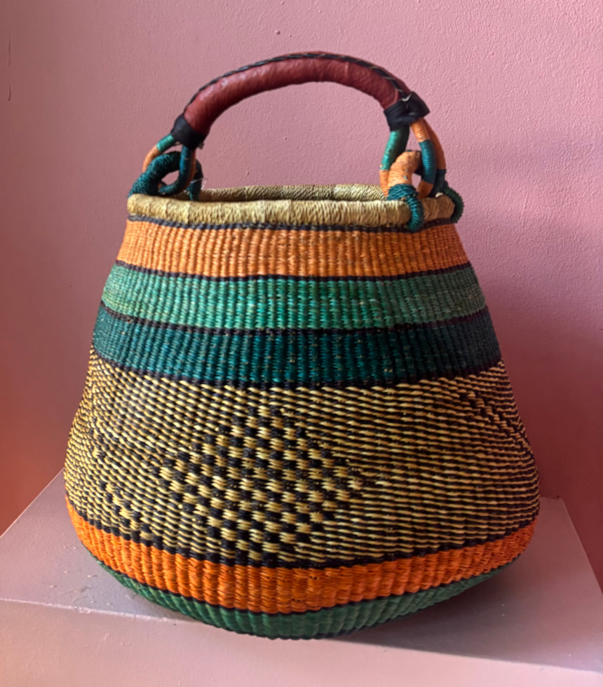 Orange basket bag with leather handles