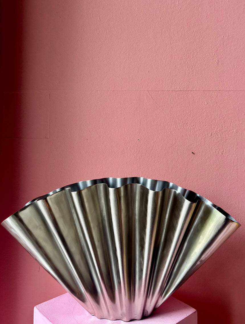 Large wave-shaped metal vase