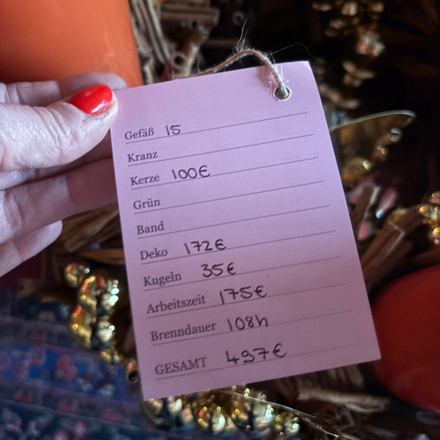 Adventskranz aus Zimt und Goldschmuck